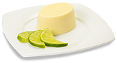 Foto: Passiertes Dessert von Lys da Capo: Limonen-Törtchen, auf einem Teller angerichtet