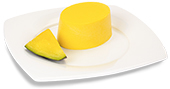 Foto: Passiertes Dessert von Lys da Capo: Mango-Törtchen, auf einem Teller angerichtet